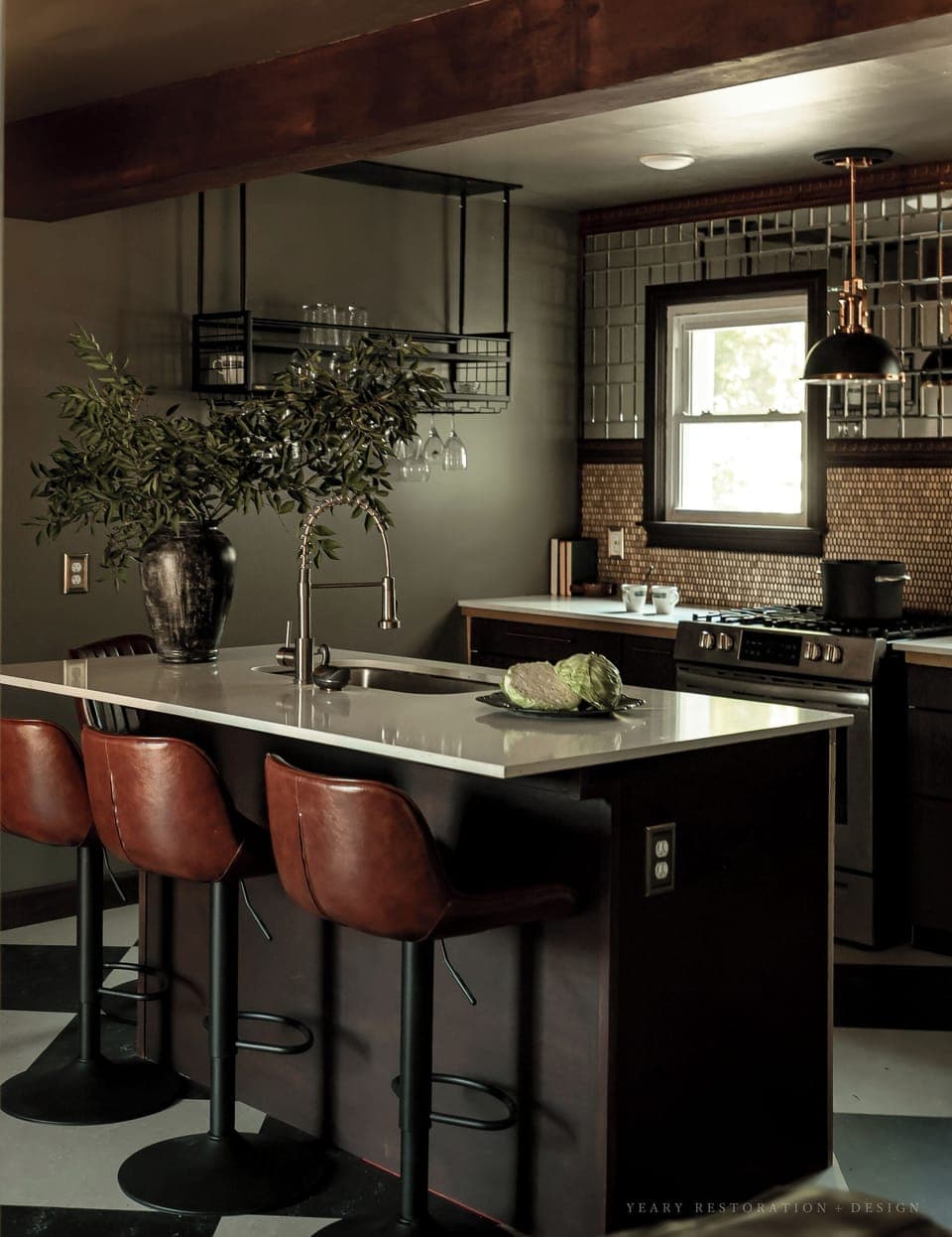 Full kitchen with mid size fridge/freezer, gas stove/oven, and kitchen island!