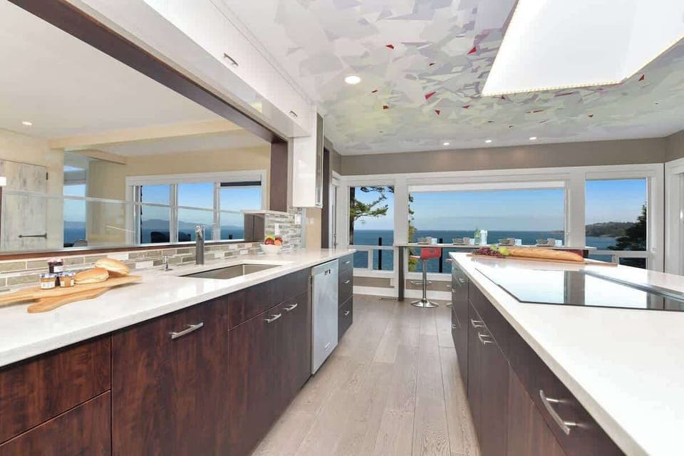 Well equipped and modern kitchen on the main level with amazing views of the ocean.