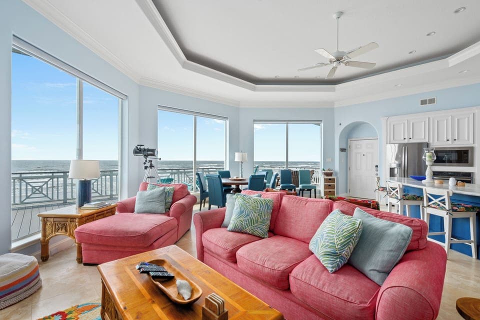 Living room with floor to ceiling windows 