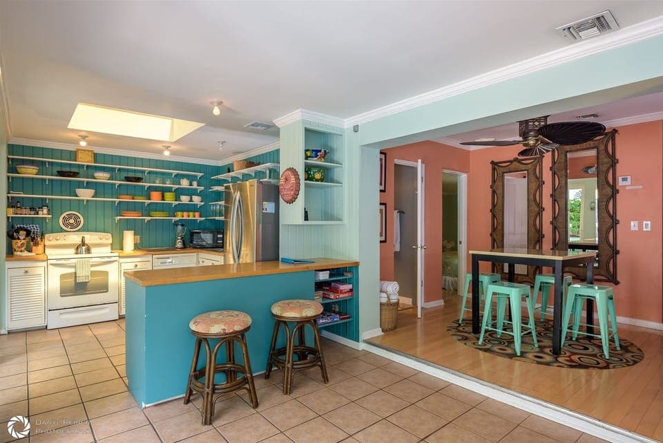 Full Kitchen with Breakfast bar with view into Dining Area