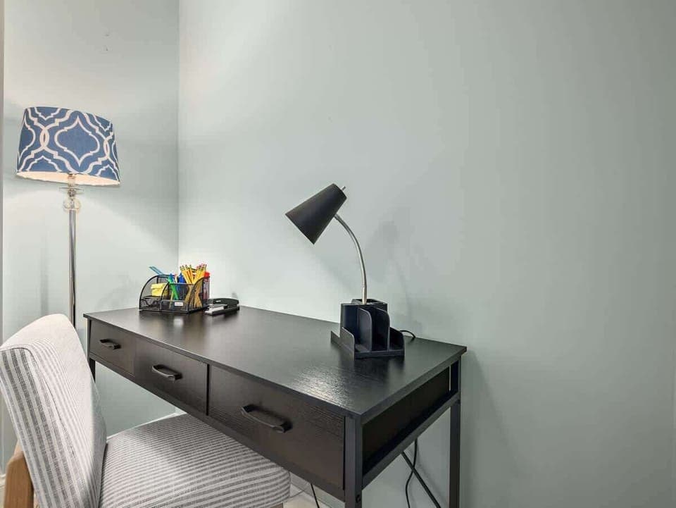 Desk located in one of the bedrooms.