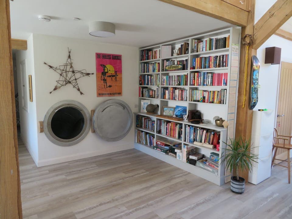 slide entrance and bookcase