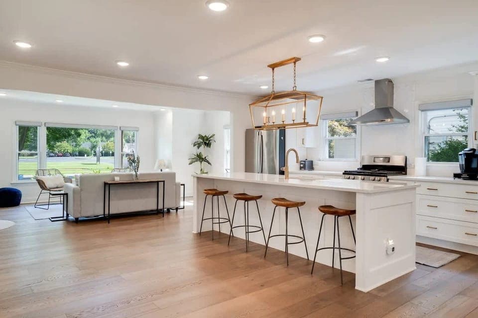 Kitchen: Elegant Kitchen and Dining Combo - Dine in style with this elegant setup featuring a sleek kitchen and a sophisticated dining area, perfect for hosting dinner parties.