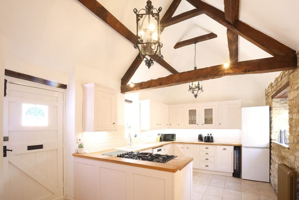 Beautiful, high beams, open plan kitchen/diner area