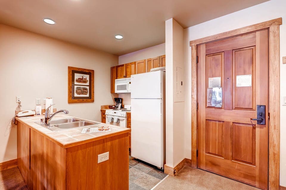 Prepare a meal in the equipped kitchen.