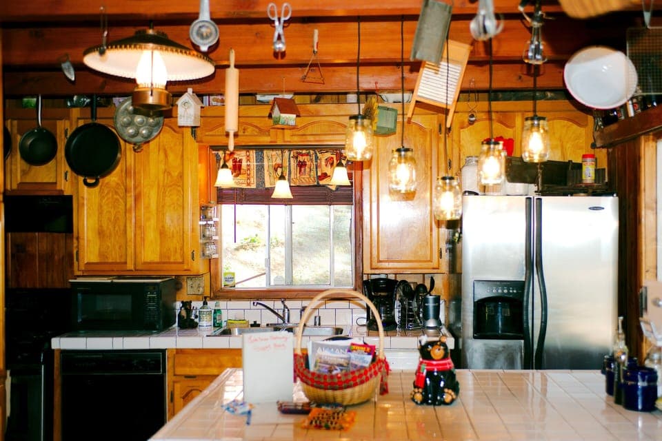 full kitchen with dining table 