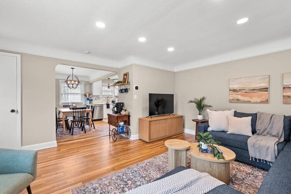 Let the warmth of the hardwood floors welcome you into this inviting living room space. #HomeIsWhereTheHeartIs