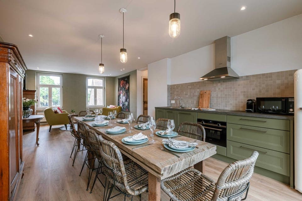Dining room with open kitchen; perfect for enjoying moments with friends and family