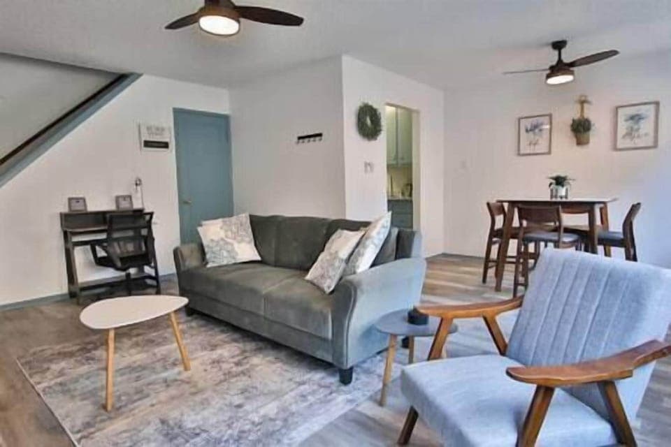 Living room with desk area for working.