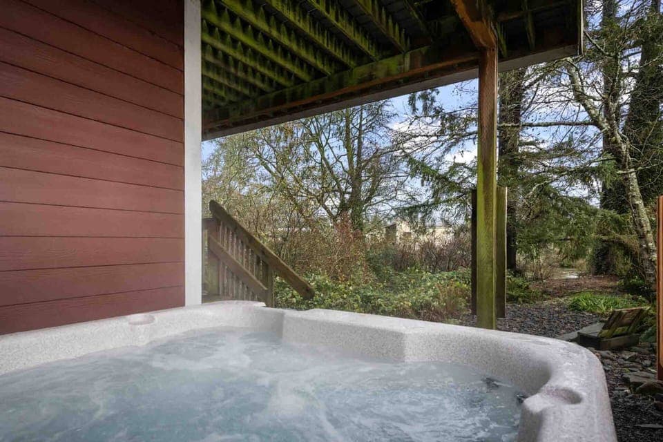 Easy access to the private outdoor hot tub.