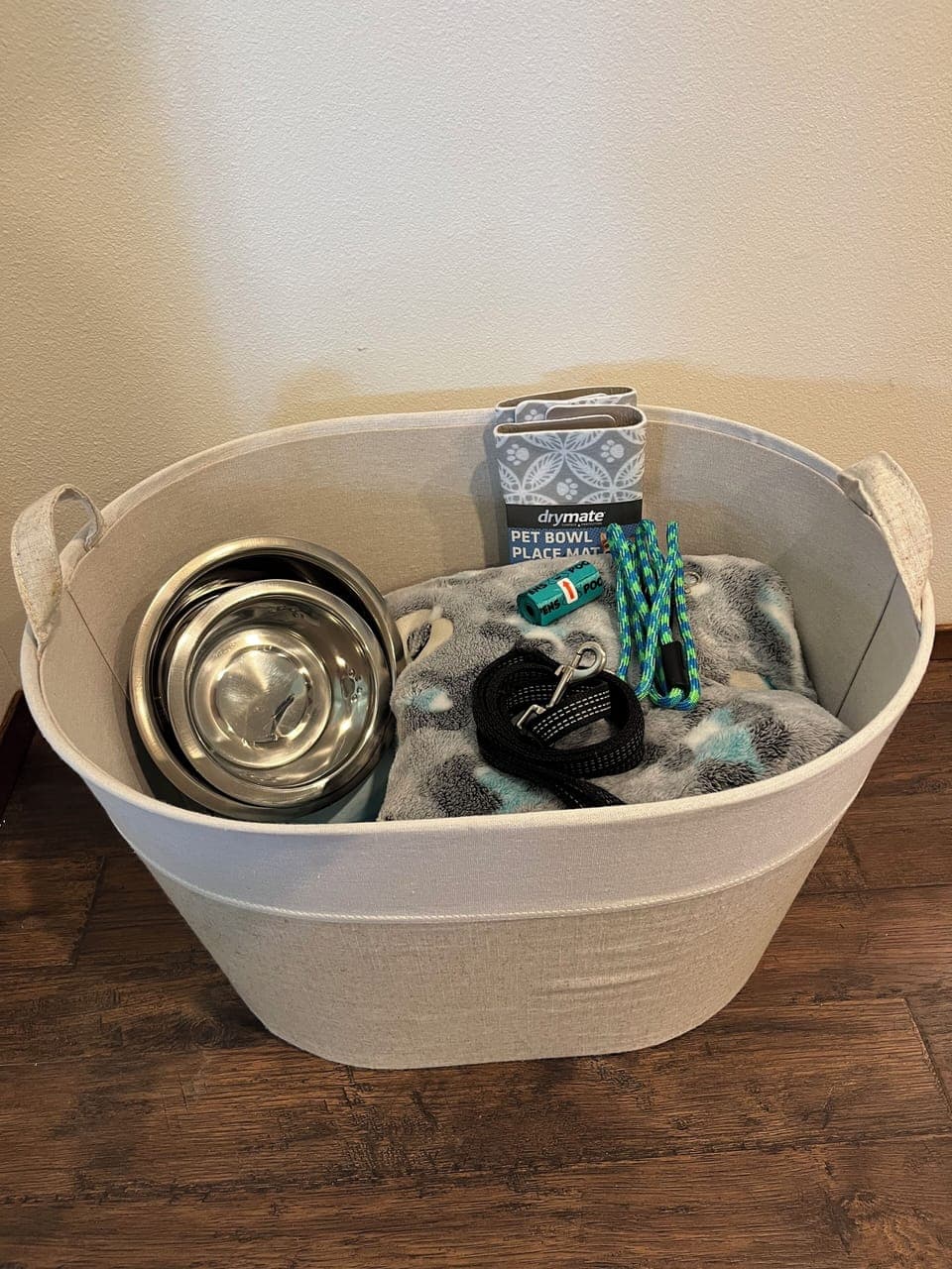 Supplies for your dogs; blankets, leashes, poop bags and food bowls