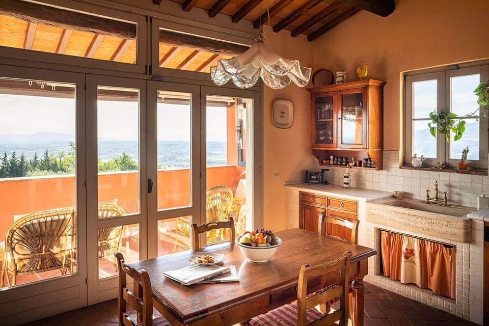 Stunning kitchen with a terrace with view in the Tuscan holiday villa for rent
