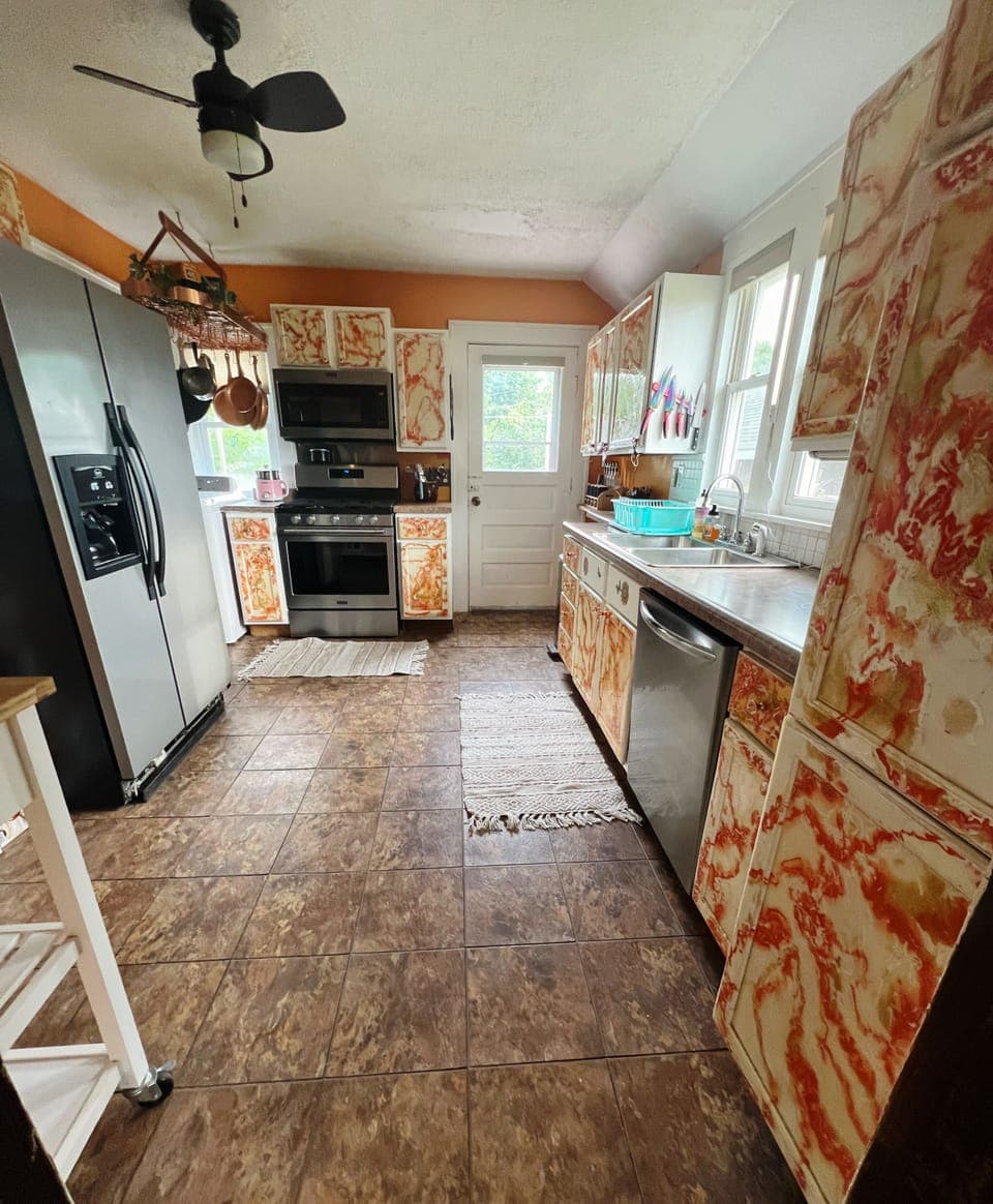 Kitchen - equipped with dishwasher, stove, microwave, coffee/tea station.
