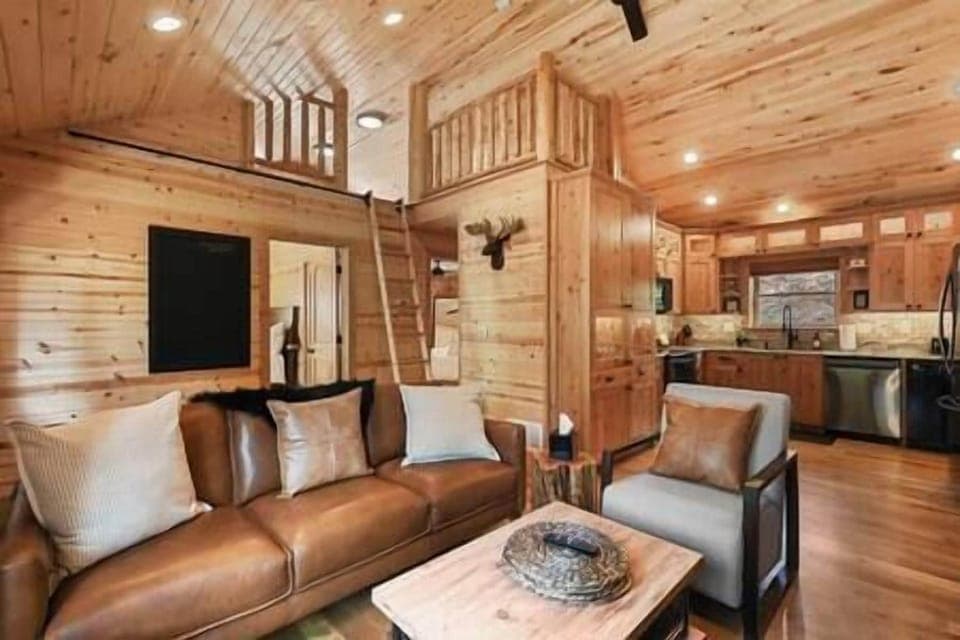 Vaulted ceiling with a loft. 