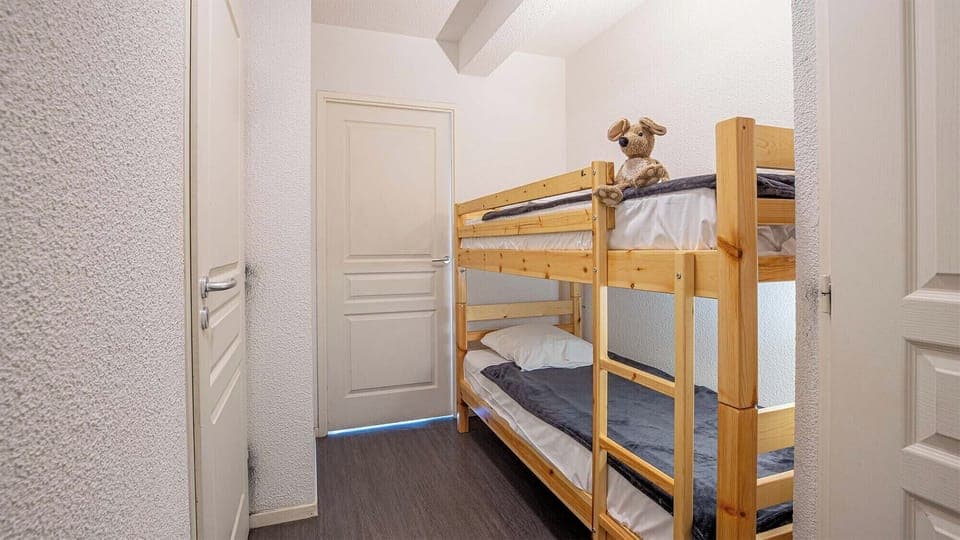 Get a peaceful night sleep in our cozy bedroom.