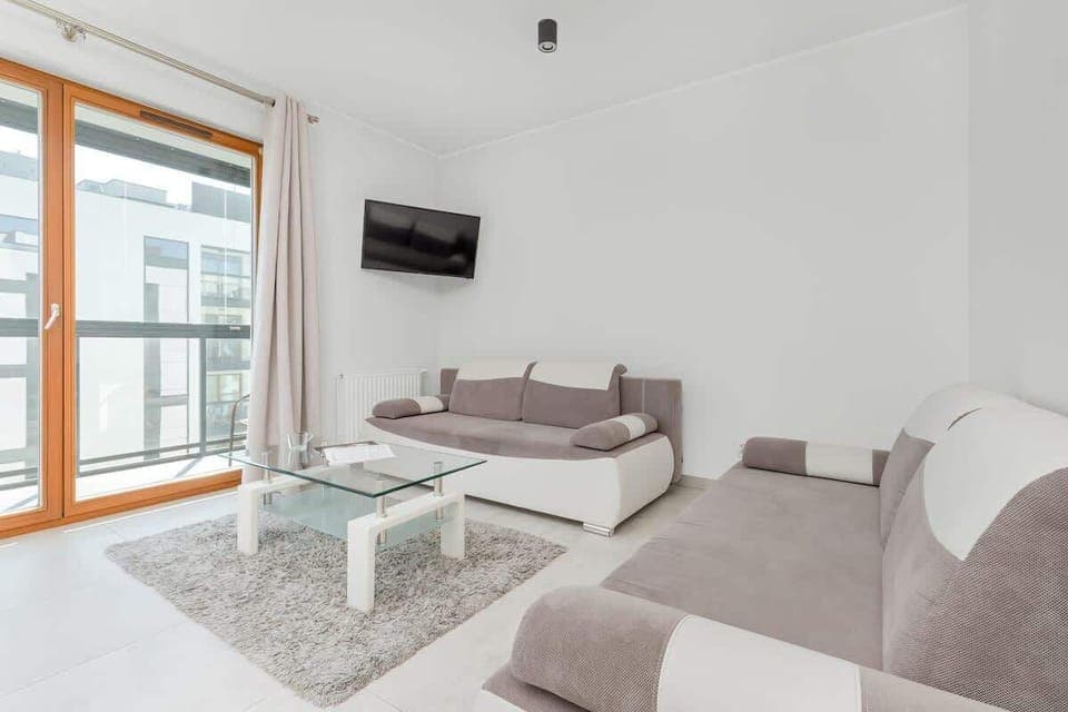 Living area with two double sofa beds.