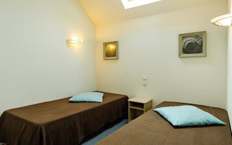 Drift to sleep in the comfortable bed after a wonderful day outside.