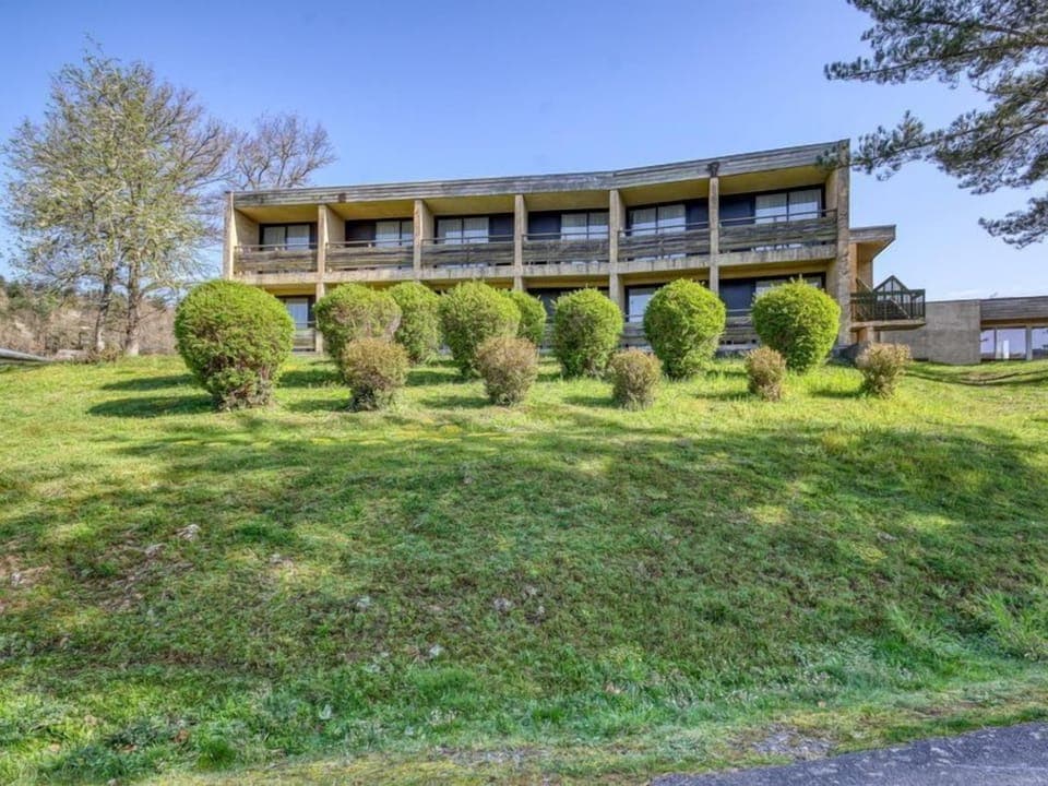 The beautiful property offers plenty of green spaces for you to relax in.