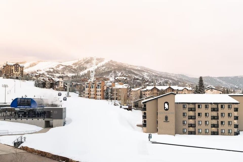 Arrive to a cozy ski-base lodge with mountain views.