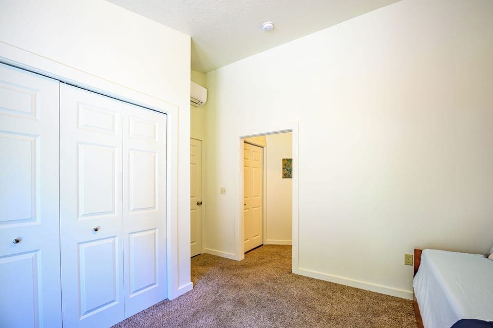 Blue House_Master bedroom is is accessed through 2nd bedroom.