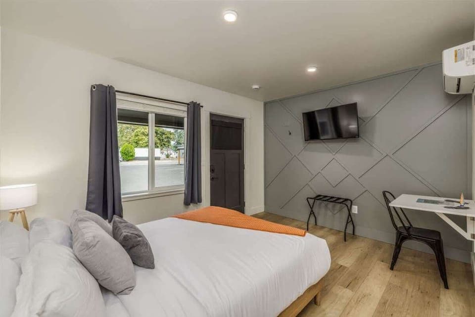 Modern studio with desk perfect for meals or a work station