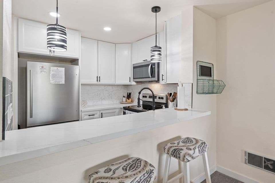 Recently remodeled kitchen with stainless steel appliances