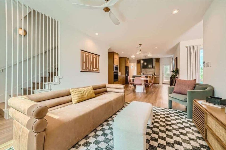 Modern living room with sleek furniture and a minimalist vibe.
