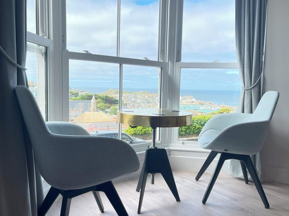 Sit at the Grand bay windows and take in the iconic view of St Ives
