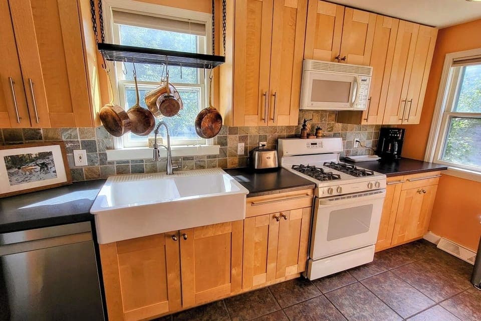 The kitchen has plenty of cabinets