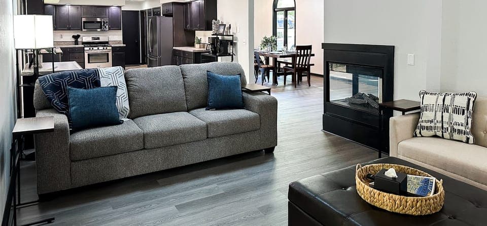 The living room flows into the expansive kitchen, dining room, and due to the open floor plan, it even flows into the upstairs master bedroom!