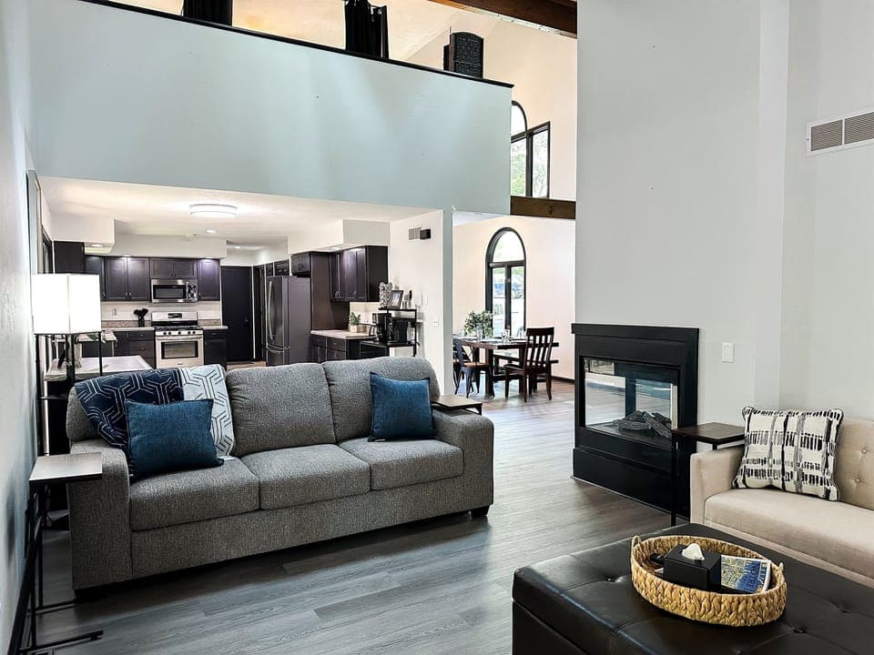 The living room flows into the expansive kitchen, dining room, and due to the open floor plan, it even flows into the upstairs master bedroom!
