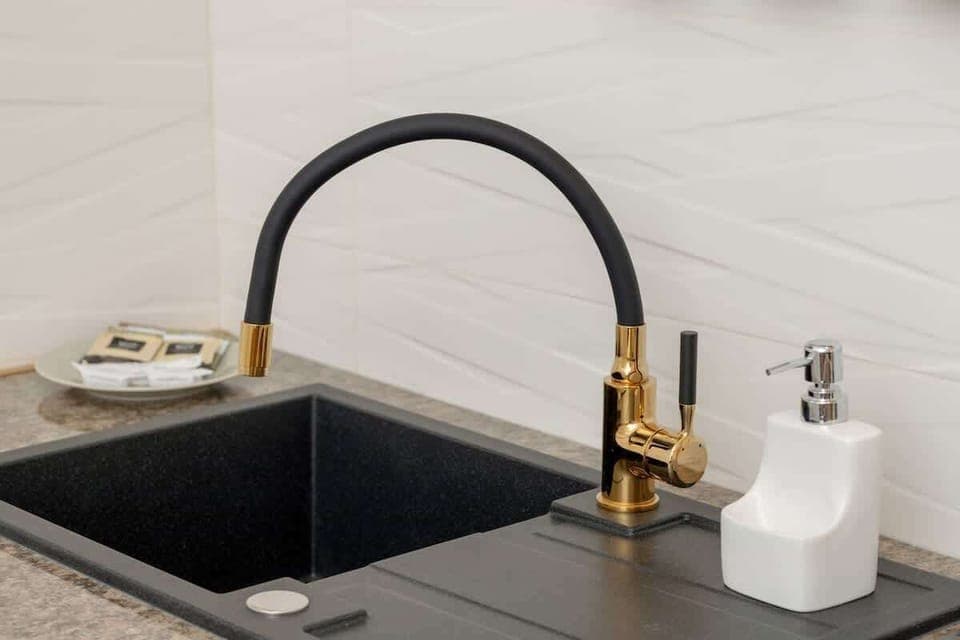 Kitchenette with a fridge.