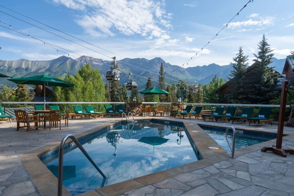 Exterior: Outdoor heated pool, 2 outdoor hot tubs