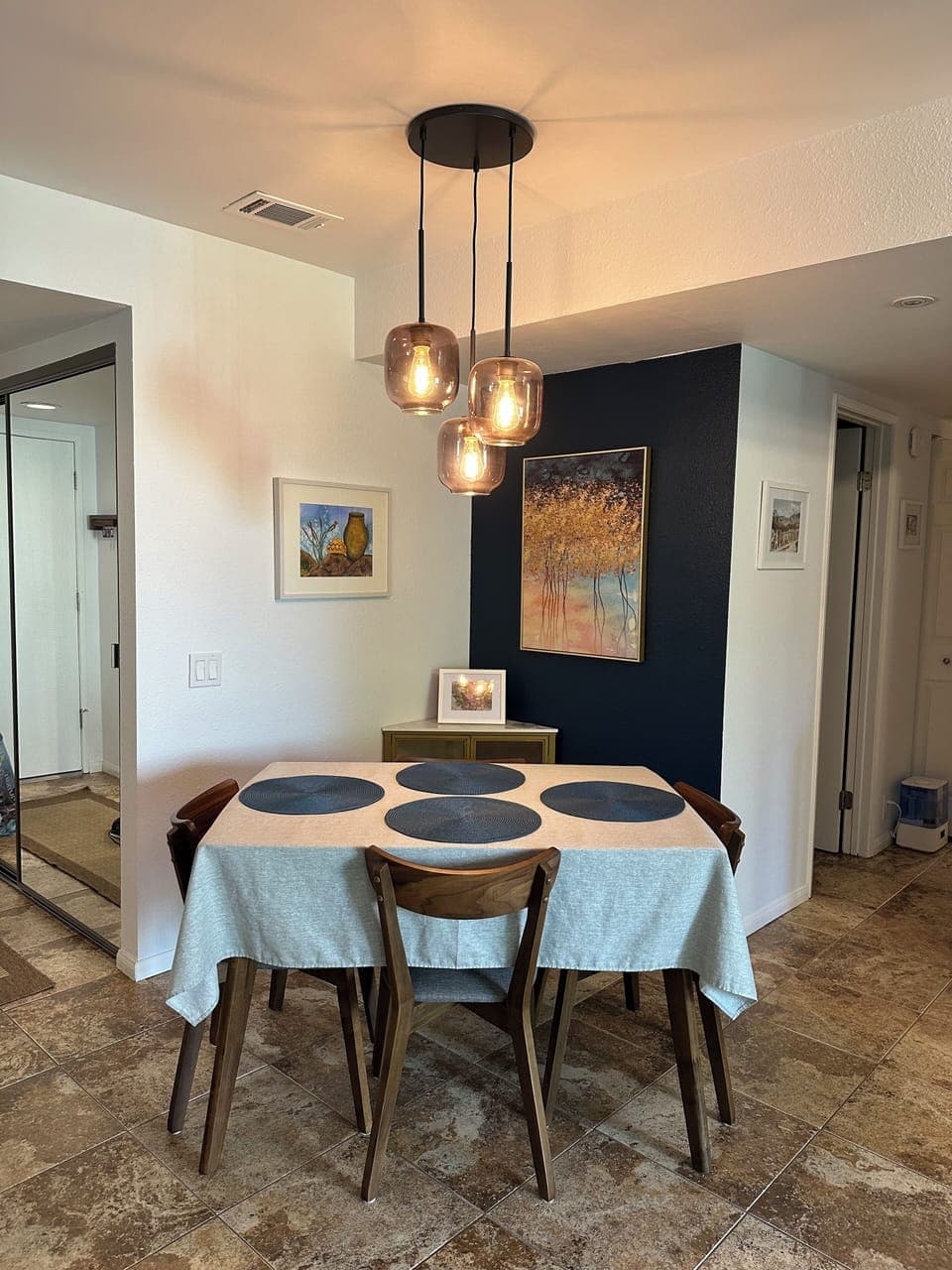 Open dining area is between the kitchen and living room for easy entertaining