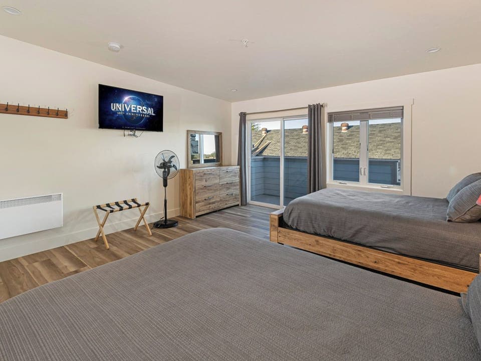 Shogun Suite has two queen beds, Smart TV, private bathroom and a porch.