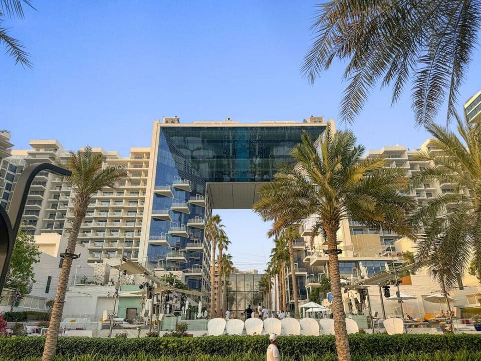 Exterior: Discover stunning architecture surrounded by lush palms and vibrant ambiance!