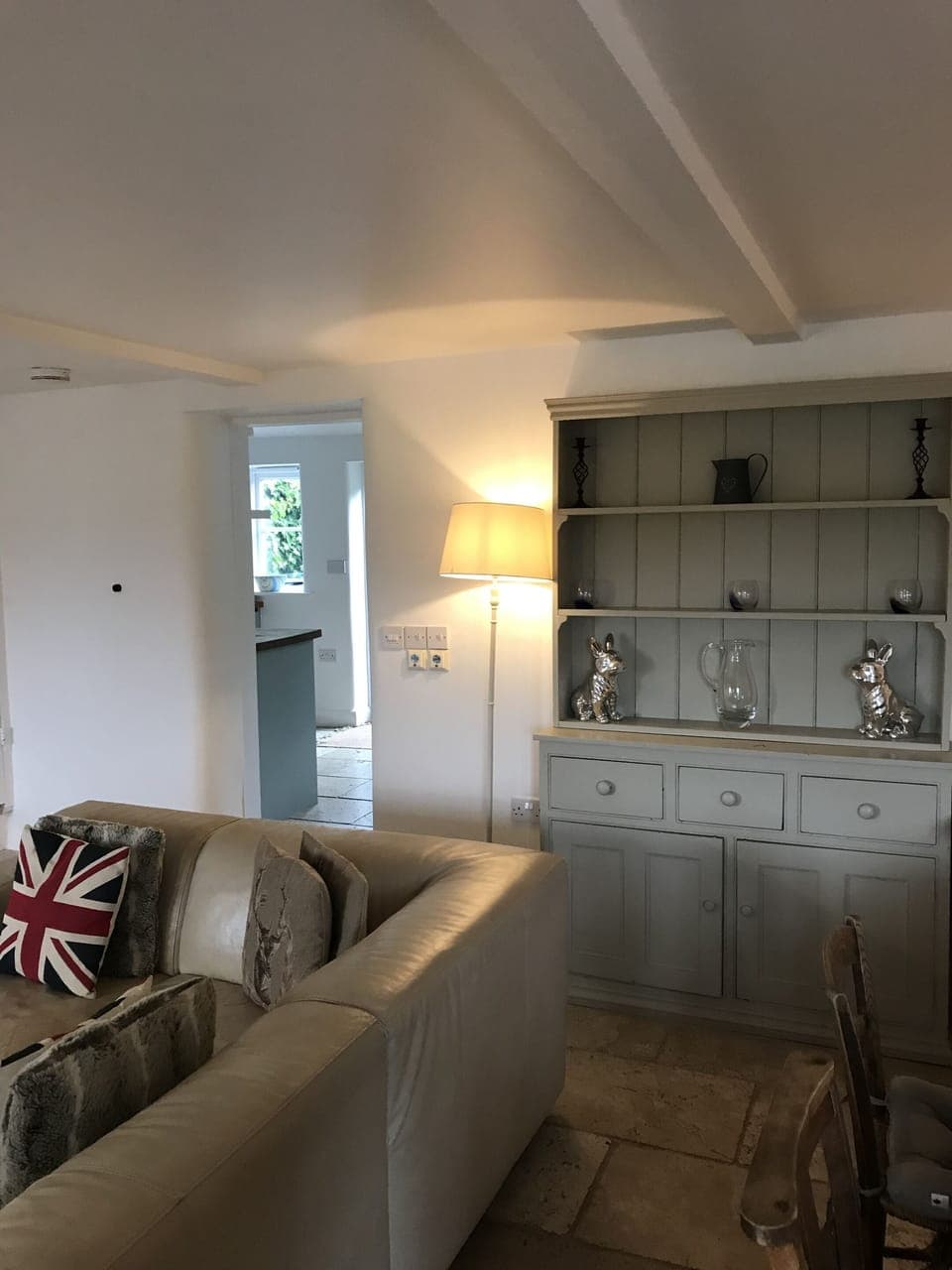 open plan living/dining with view of kitchen beyond