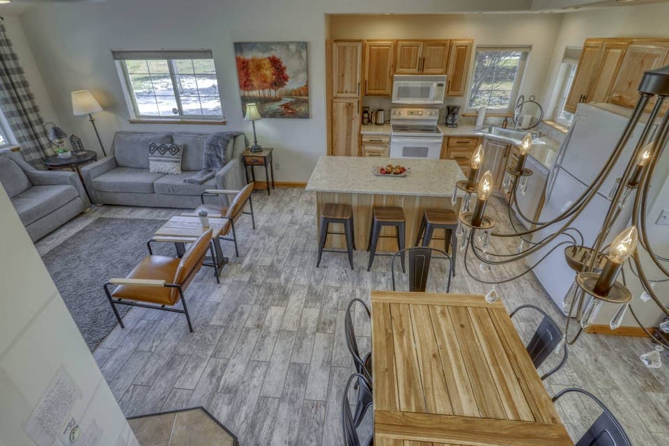 The open concept, main floor family space is complete w/ powder room and master suite. Making this layout ideal for multi families and gatherings.