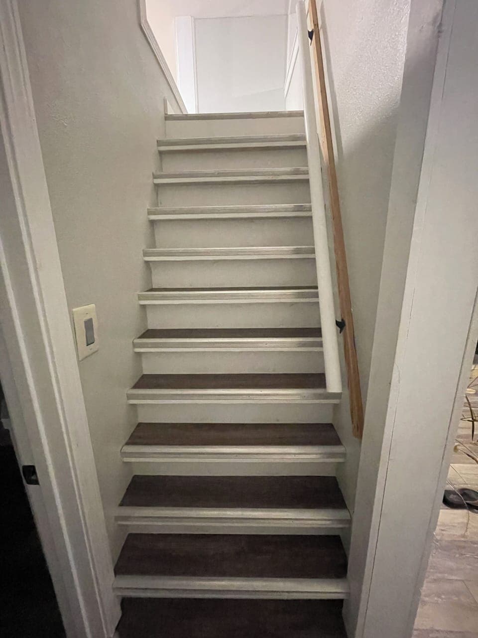 steep and narrow stairway to access loft above lower bedroom