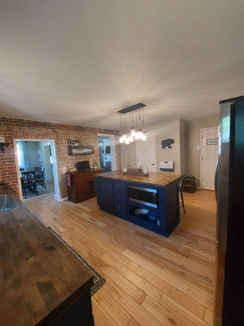 Fully stocked kitchen with large island.