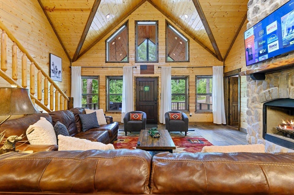 [Main Level: Living Room] 65" smart TV (BYO Login). Gas fireplace