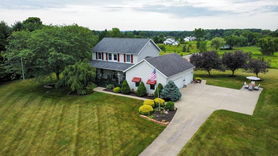 Spacious 3 Car Garage & Plenty Of Parking For Trailers Or RV.