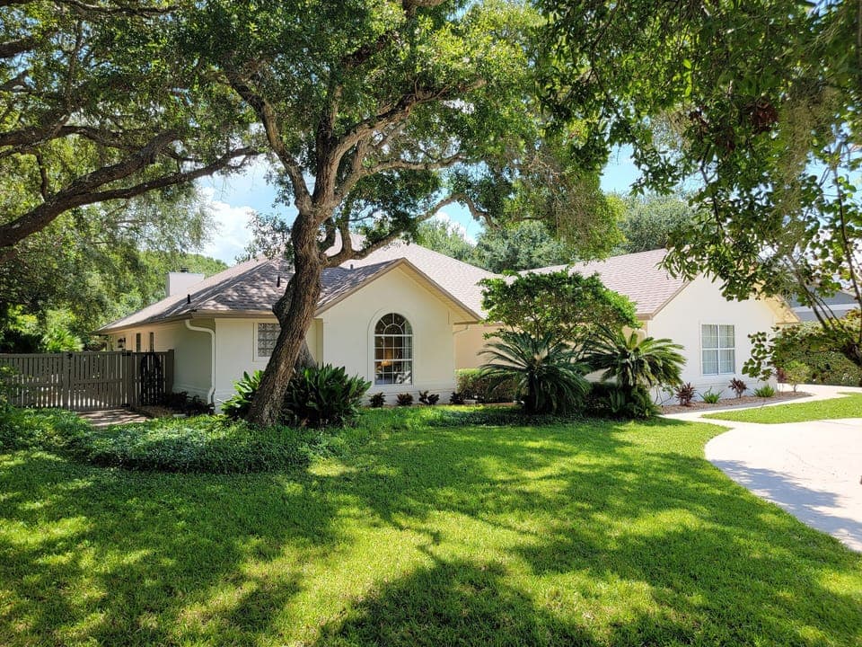 This private retreat is just steps from the beach and the river