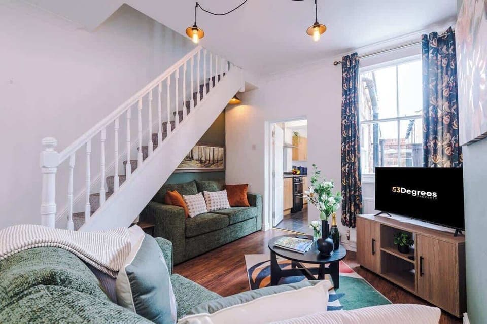 The spacious living room benefits from a double sofa-bed, Smart TV with Netflix and plenty of space to sit down after a long day exploring Chester.