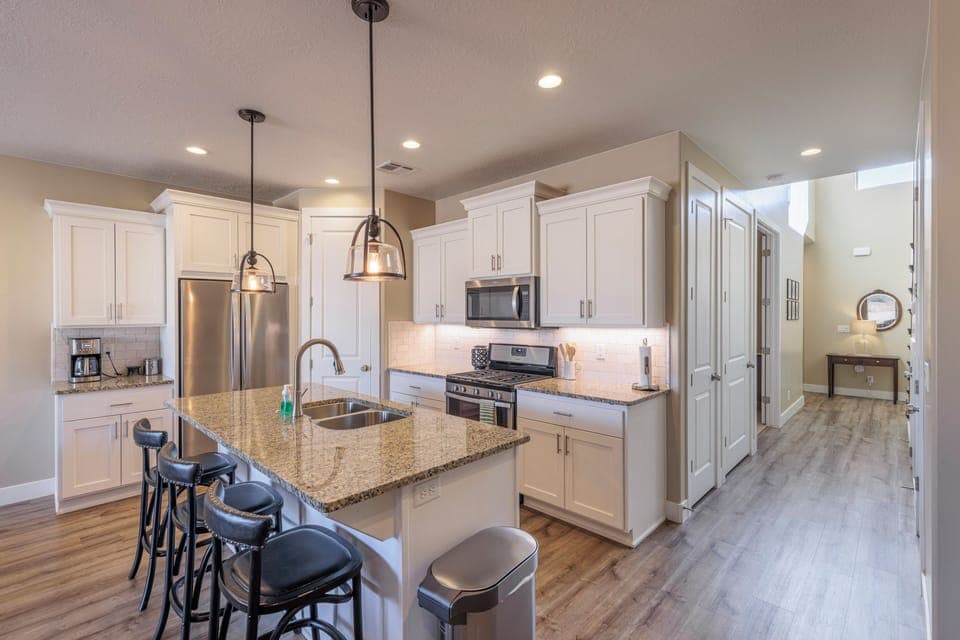 Kitchen Side View - Kitchen view showing you hallway to entry way