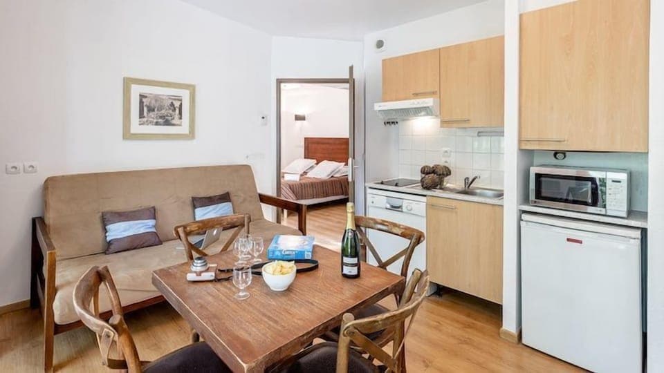 Enjoy a tasty meal around the dining table.