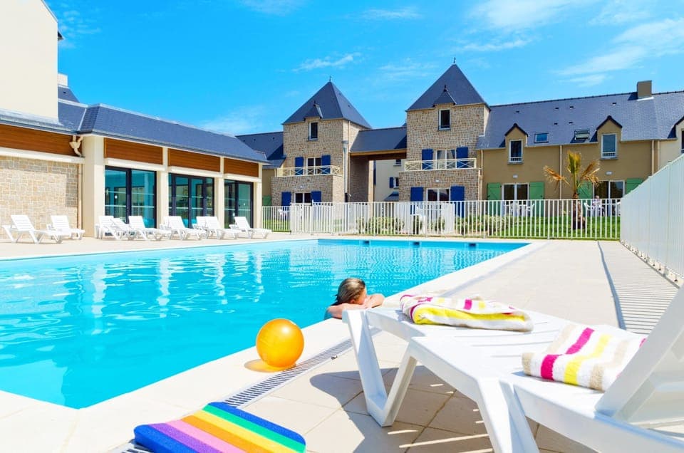 Spend time with loved ones in the outdoor pool, open during the summer.