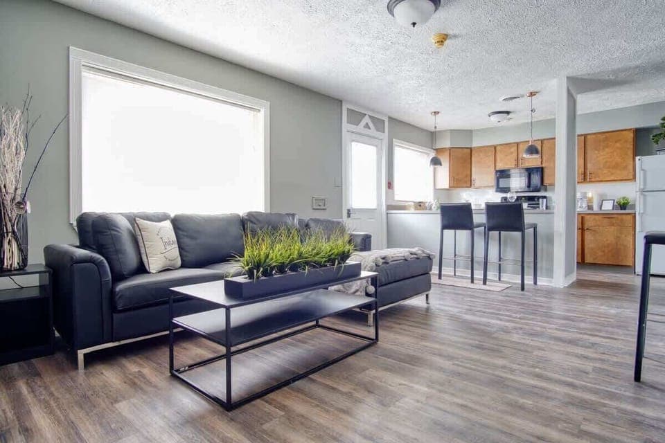 This expansive living space includes WIFI, TV, and a new sofa for kicking back and watching your favorite show or movie.