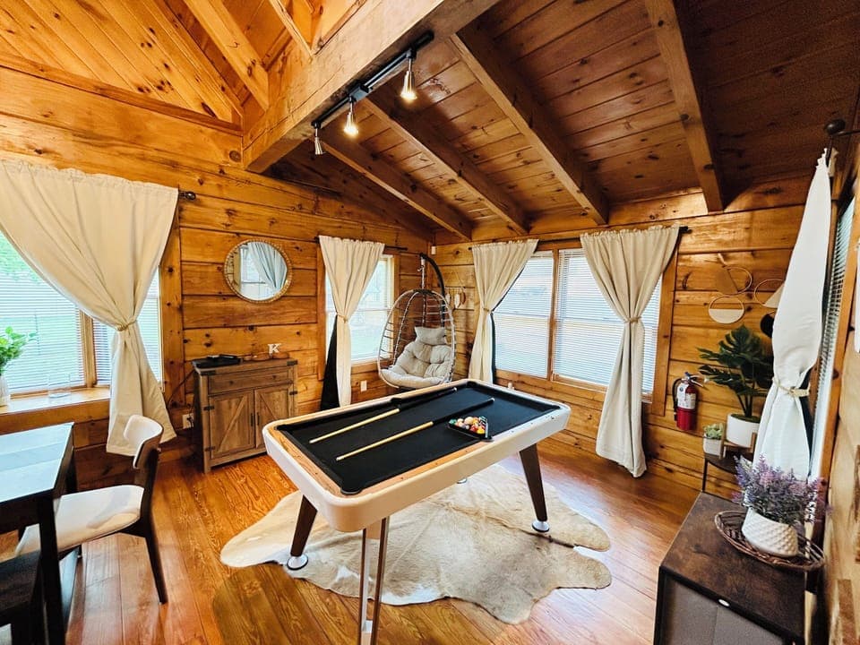 Pool table, egg chair
