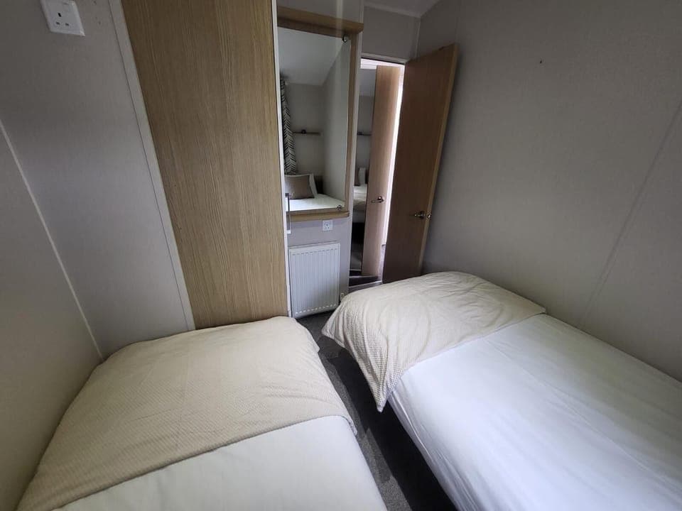 Enjoy the convenience of comfortable bedrooms in your caravan at Valley Farm Holiday Park, located near the vibrant Princes Theatre Clacton on Sea Essex and the bustling Shopping Village Clacton on Sea Essex.